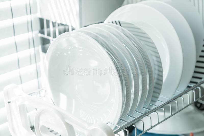 Clean dish on a dish rack stock photography