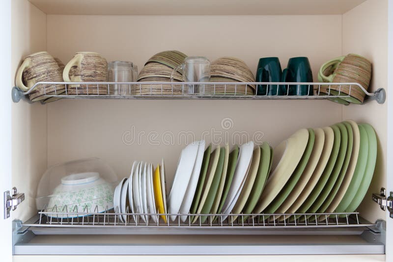 https://thumbs.dreamstime.com/b/clean-dishes-white-green-tones-drying-cabinet-cups-glasses-mugs-plates-bowls-saucers-metal-shelves-concept-kitchen-204407848.jpg