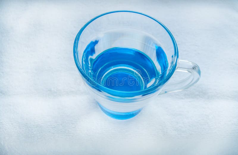 Clean Drinking Water with Bubbles in a Clear Blue Glass Stock Image