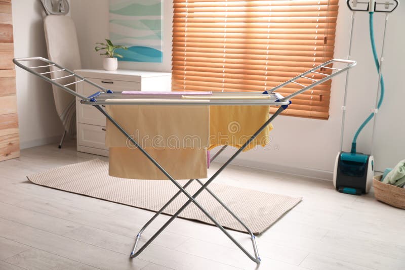Clean Laundry Hanging on Drying Rack Indoors Stock Photo Image of