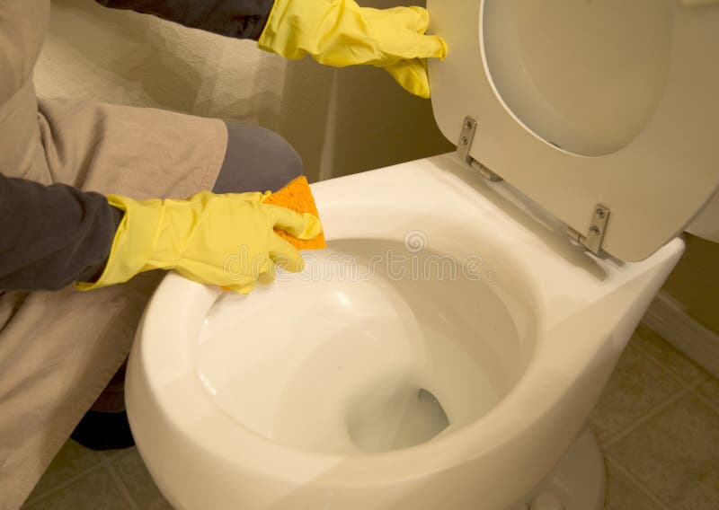 Clean toilet with sponge stock image. Image of commode 67182801