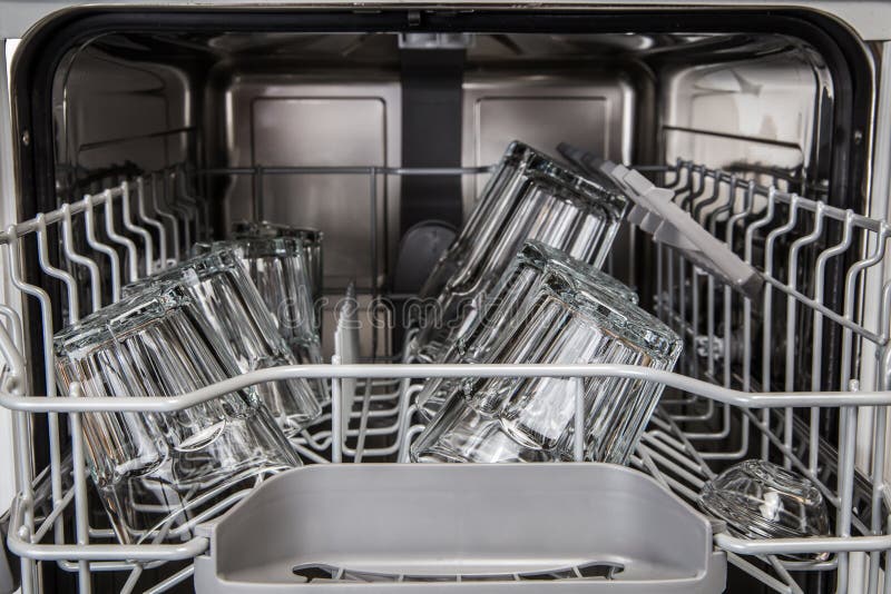Clean Transparent Glasses in Modern Dishwasher Machine Stock Photo
