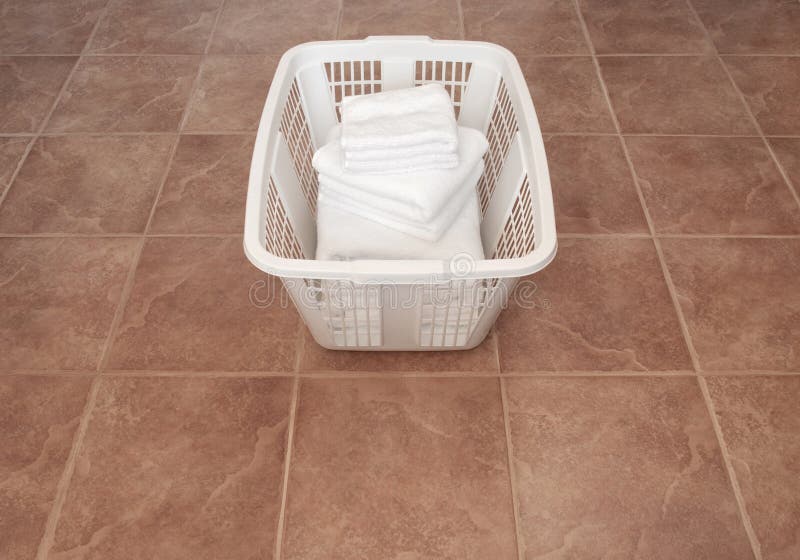Laundry Basket with White Towels on Wooden Floor Stock Photo Image of material, floor 23674226