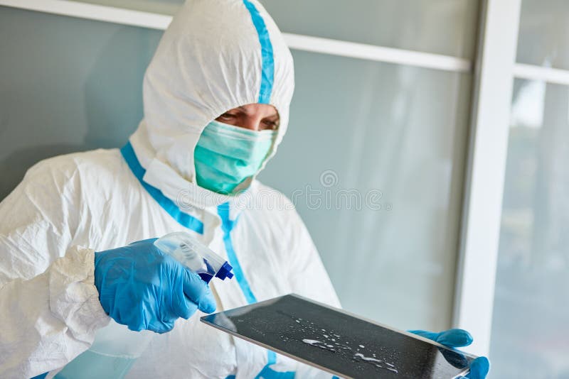 Cleaner Cleaning the Touchscreen of a Tablet Computer Stock Photo