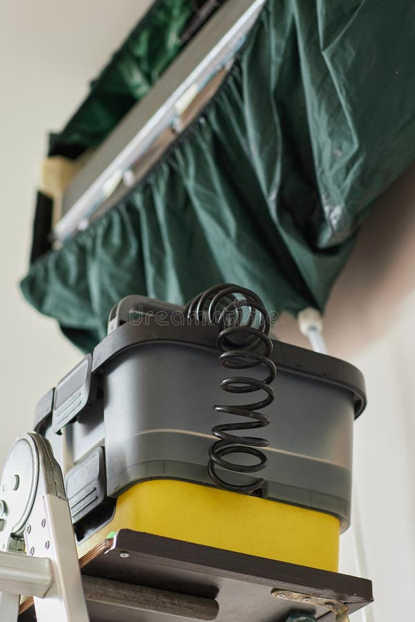 Cleaner machine for air conditioner, air conditioner with waterproof drain cover stock image