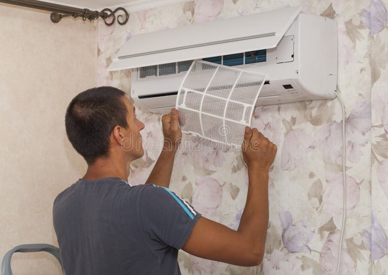 Cleaning the Air Conditioner Stock Photo Image of service