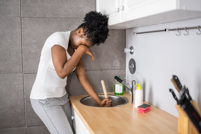 Cleaning Blocked Sink and Drain in Kitchen Stock Photo Image of