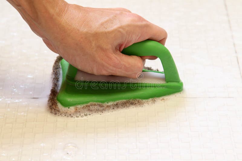 Cleaning ceramic tiles stock image. Image of chemical 196237271