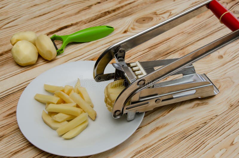 Potato cutter hi-res stock photography and images - Alamy