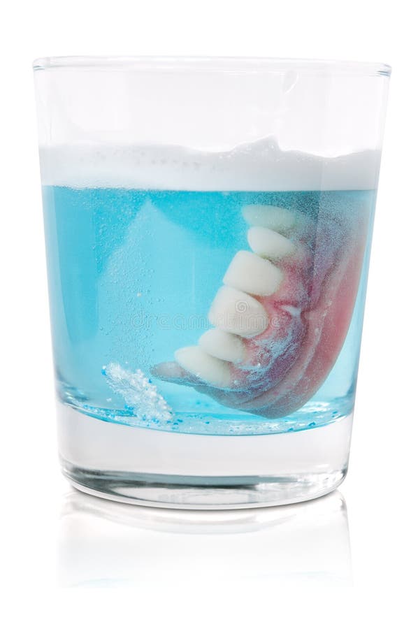 Cleaning dentures in glass stock image. Image of healthcare 18053907
