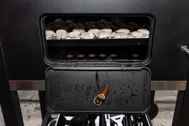 Cleaning a Dirty Grill while Standing on the Terrace and Emptying the