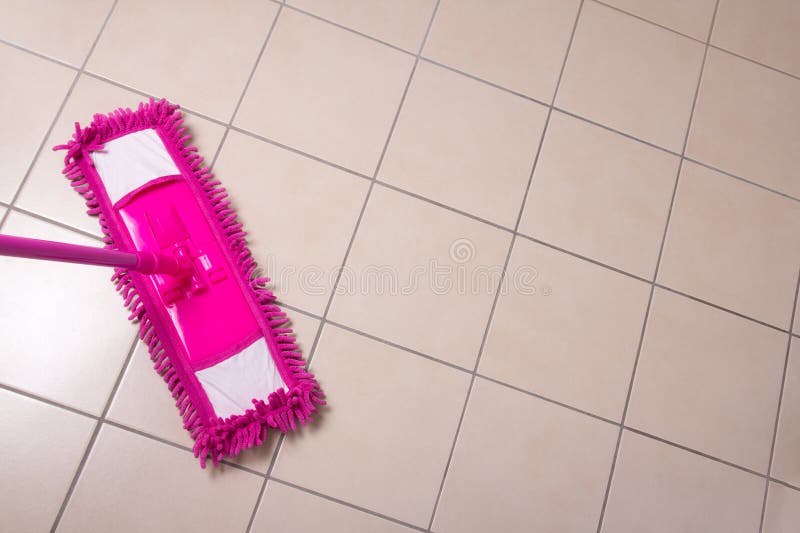 Premium Photo  Close up picture of wooden floor with pink cleaning mop