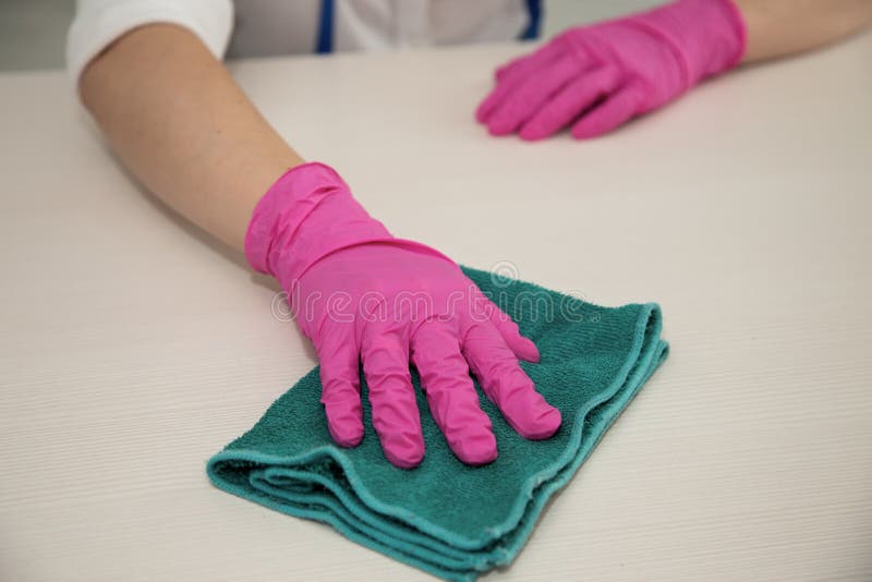 Cleaning the House. Cleaning in Pink Rubber Gloves. Stock Photo Image