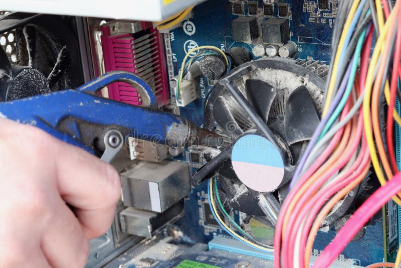 Cleaning the Inside of a Computer with Compressed Air. Maintenance and
