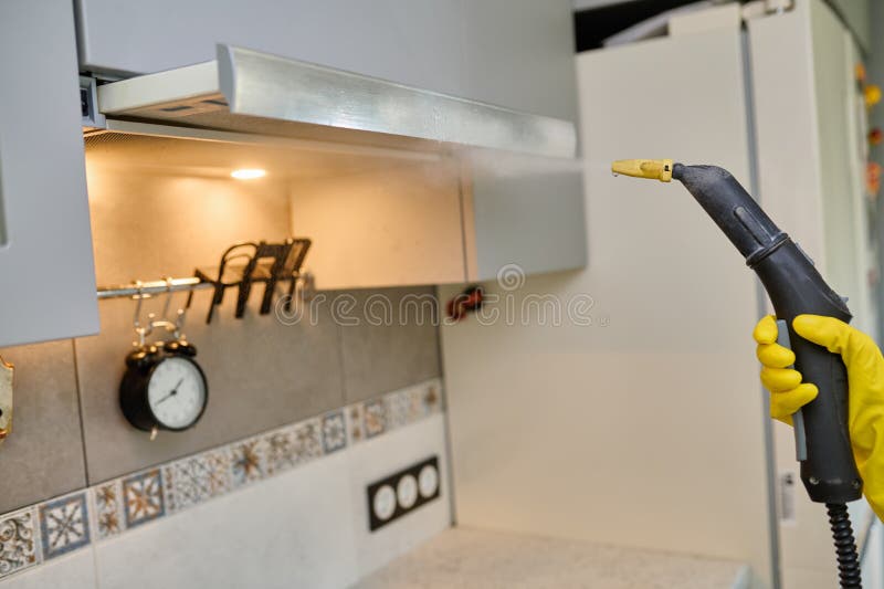 Cleaning the Kitchen Hood with an Electronic Steam Generator from Dirt, Dust and Grease. Kitchen