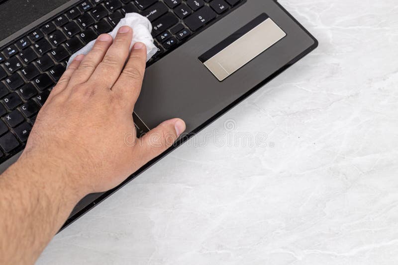 Cleaning Laptop with Disinfection Protective Alcohol Tissue Stock Image