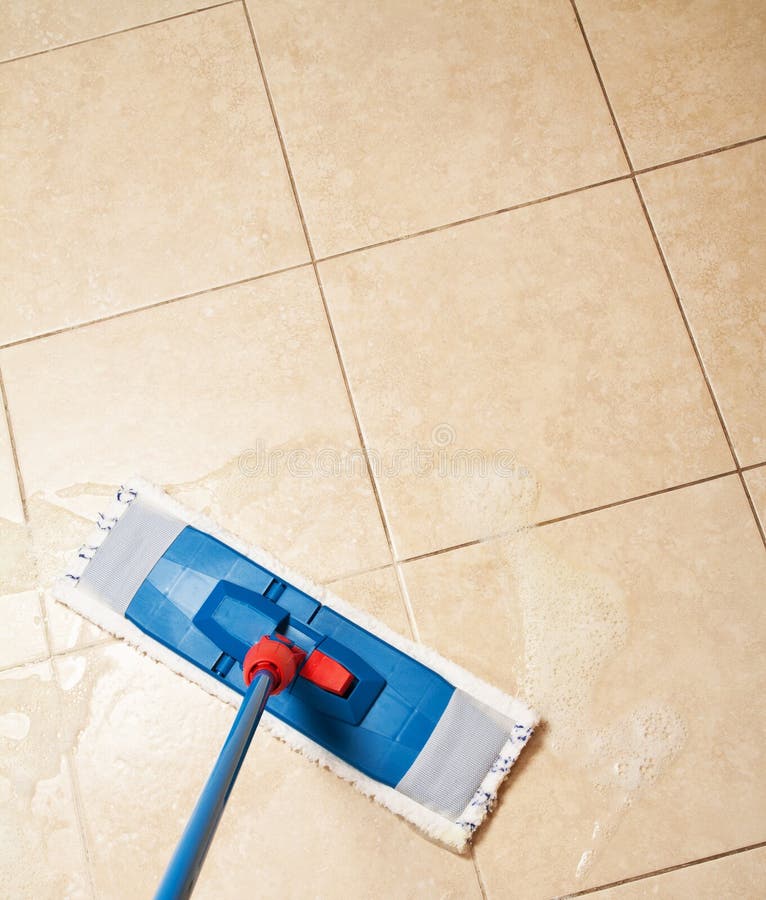 Cleaning with the mop royalty free stock photo