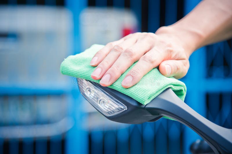 Cleaning motorcycle stock image. Image of wash, hand 101772567