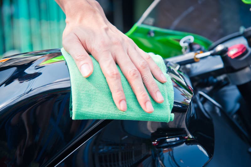 Cleaning motorcycle stock photo. Image of hand, clean - 101775130