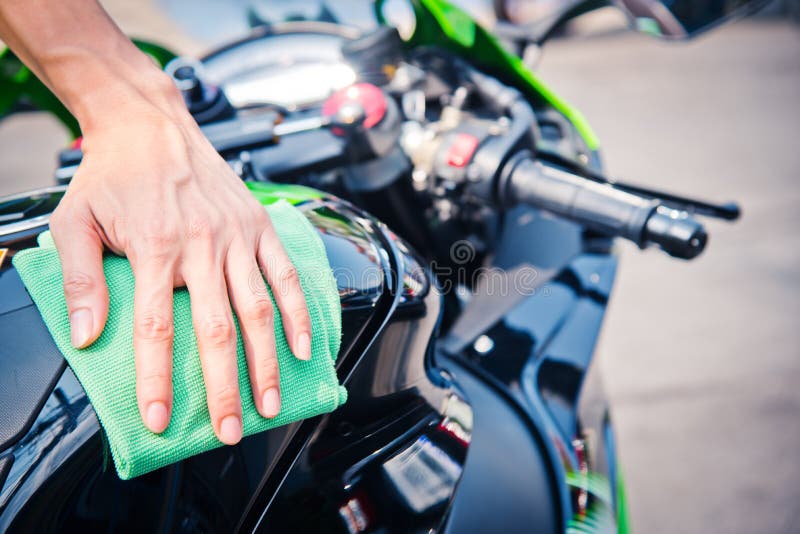 Cleaning motorcycle stock photo. Image of wash, white 101775836