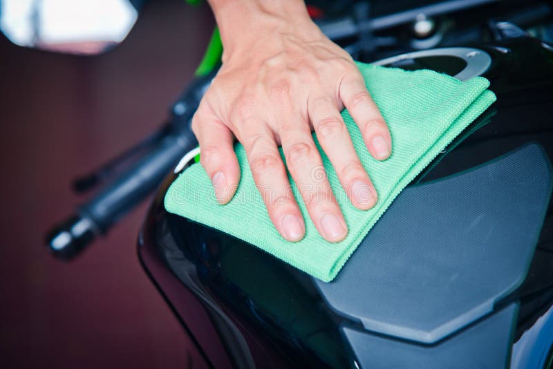 Cleaning motorcycle stock photo. Image of worker, cloth 101772190