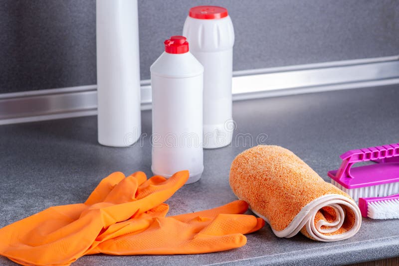 Cleaning Products on the Kitchen Table. Various Cleaning Products