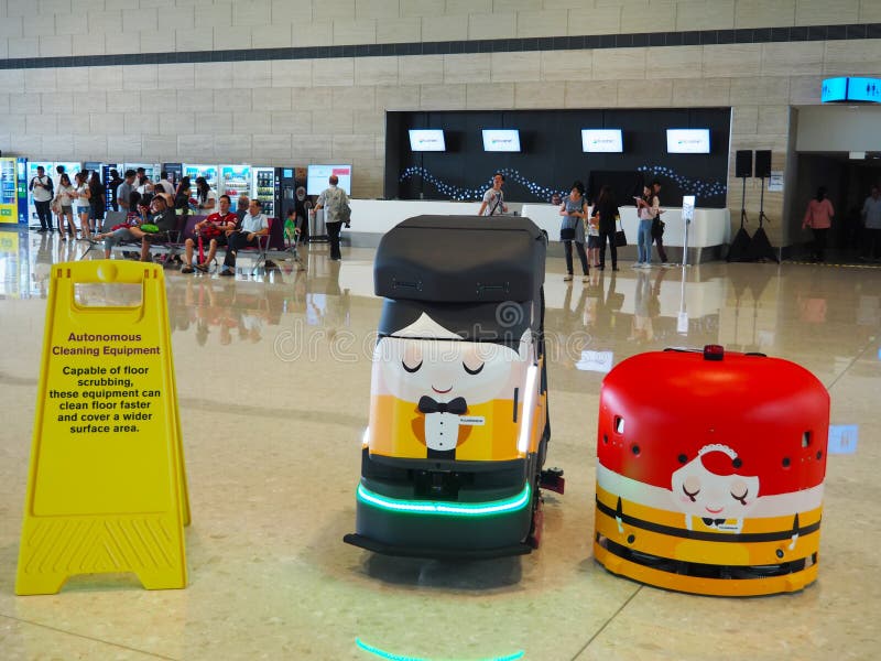 Cleaning Robots at Changi Airport Terminal 4, Singapore royalty free stock images Cleaning Robots at Changi Airport Terminal 4, Singapore royalty free stock images