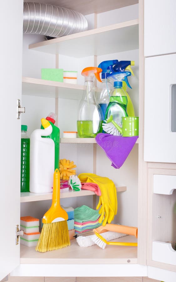 Cleaning supplies and tools on shelves and cabinets in pantry room Stock  Photo - Alamy