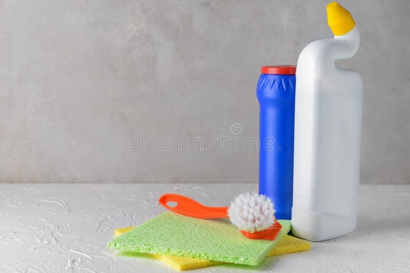 Cleaning Supplies on White Table Stock Photo Image of light