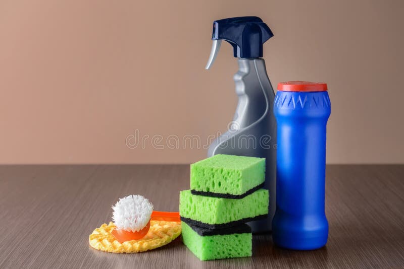 Cleaning supplies on wooden table stock photo Cleaning supplies on wooden table stock photo