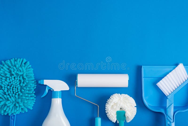 Cleaning tools blue background