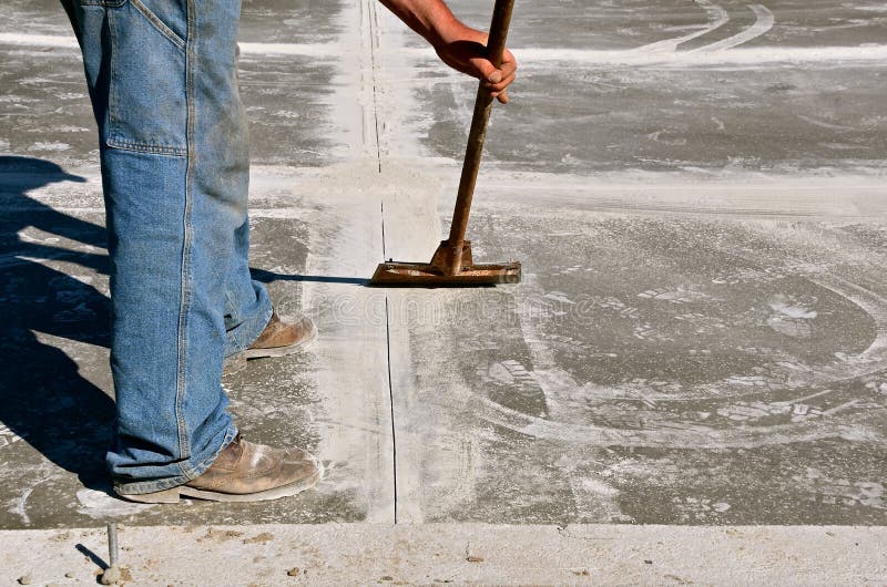 Cleaning Up Cement Dust After Cutting Expansion Joints Stock Image - Image of lines, concrete How To Clean Up Concrete Dust