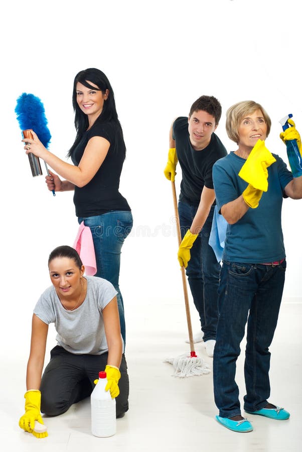 Happy team of four smiling people cleaning your house,each person doing something different. Happy team of four smiling people cleaning your house,each person doing something different