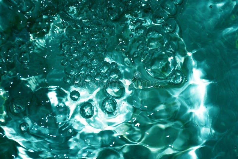 Clear Green Sea Surface with Sparkling Bubbles, Concept for Refreshing
