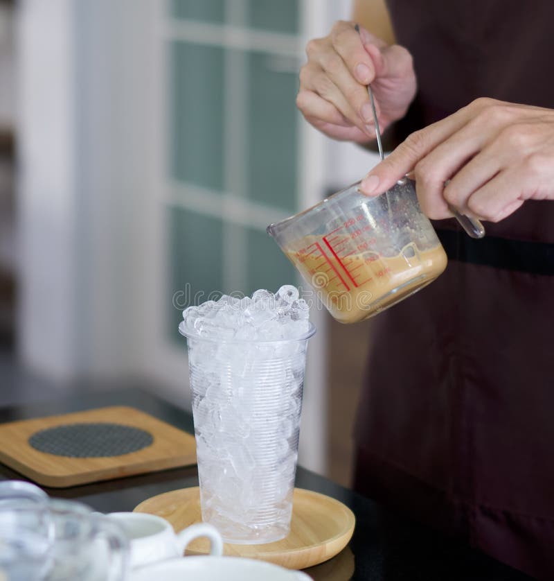 Group Of Ice Cubes In Plastic Cup Stock Photo, Picture and Royalty Free  Image. Image 74989794.