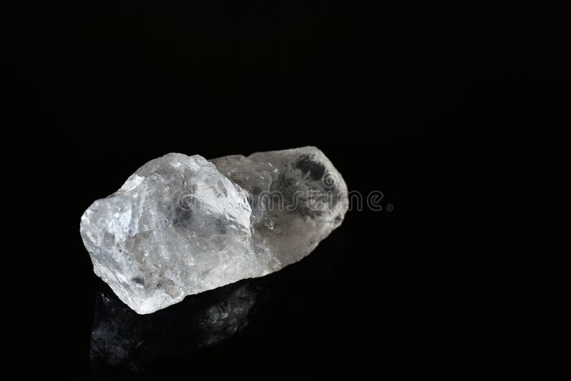 Clear Quartz Crystal on a Black Background Stock Image Image of