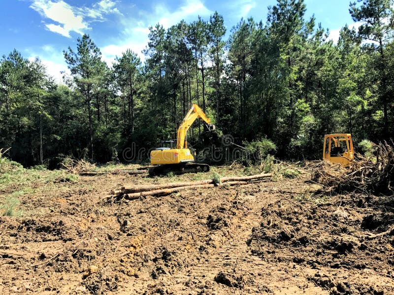 Clearing land and logging timber