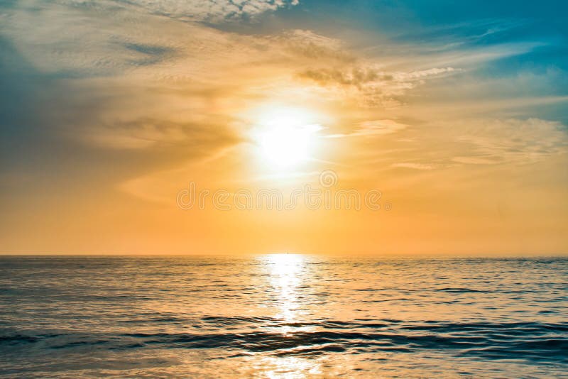 Colorful sunset sky on the sea at Gulf Coast Beaches.