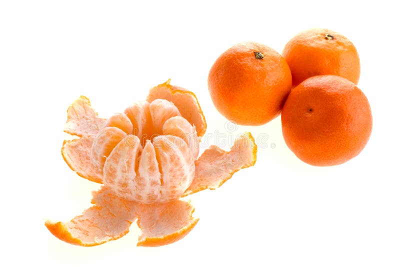 Sweet clementines, whole and peeled. Sweet clementines, whole and peeled