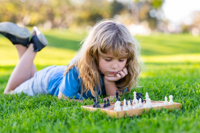 Clever Concentrated and Thinking Child while Playing Chess. Thinking Child.  Chess, Success and Winning Stock Image - Image of decisions, chess:  175817817