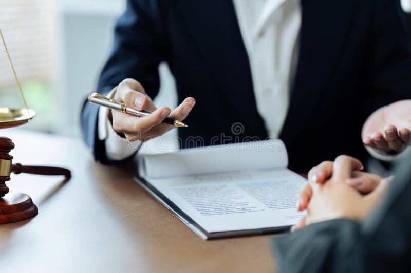 Client was listening to a lawyer advising, explaining the details of the proceeding. Client was listening to a lawyer advising, explaining the details of the proceeding.