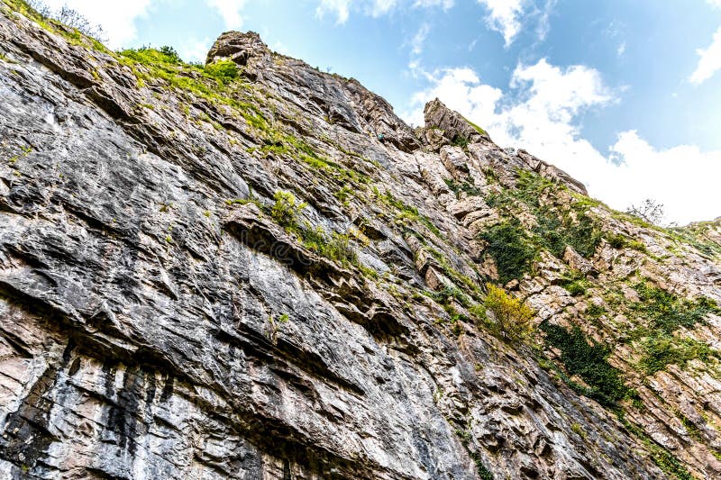 Cliff stone located part of the mountain rock isolated on white background royalty free stock photos