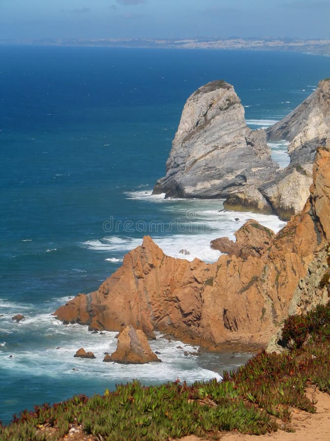 High cliffs at portugal cape de roca. Cliffs rough sea sunset stock images, royalty-free photos and pictures
