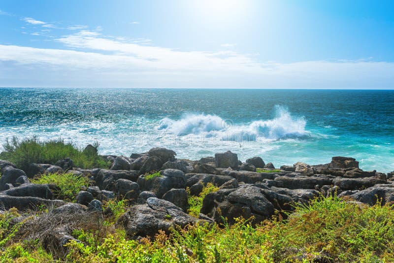The cliffs on the coast of the Atlantic Ocean. Ocean waves, Casc stock photography The cliffs on the coast of the Atlantic Ocean. Ocean waves, Casc stock photography