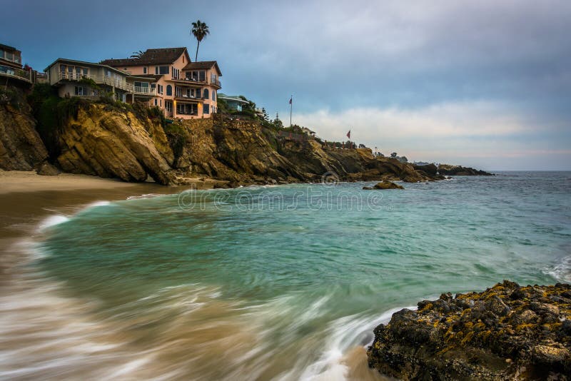 Cliffs and Houses at Woods Cove Stock Image - Image of urban, clouds ...