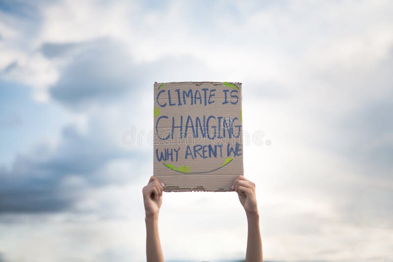 Climate change concept, Demonstration of children with message against Global Warming