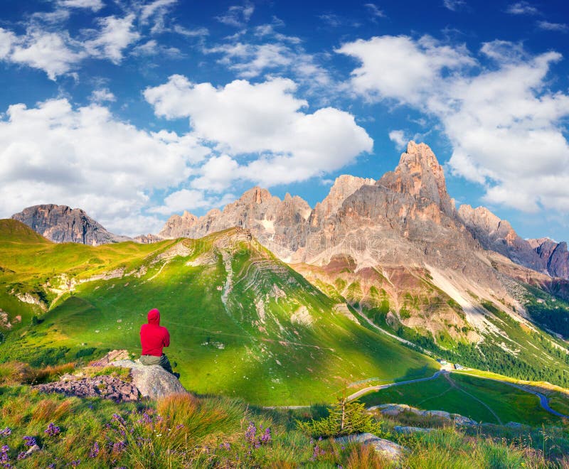 Climber admiring of the landscape of Pale di San Martino