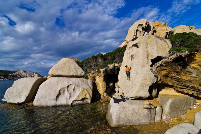 Climber bouldering in Sardinia