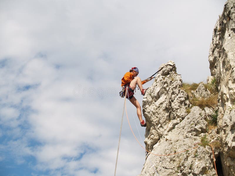 Climber rapelling