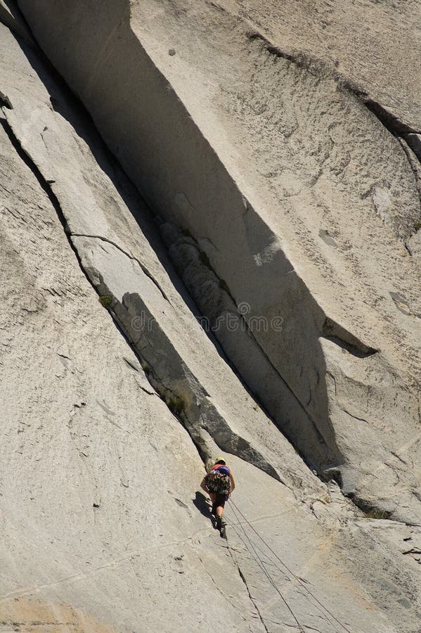 Climber on rock face stock photos Climber on rock face stock photos